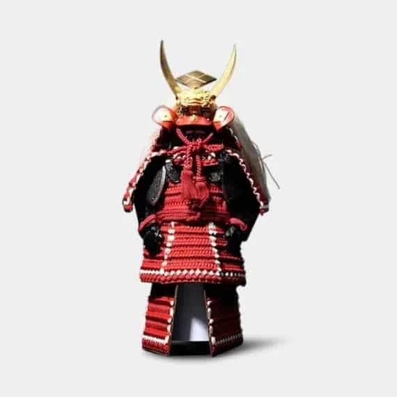 A red and black miniature Samurai outfit.