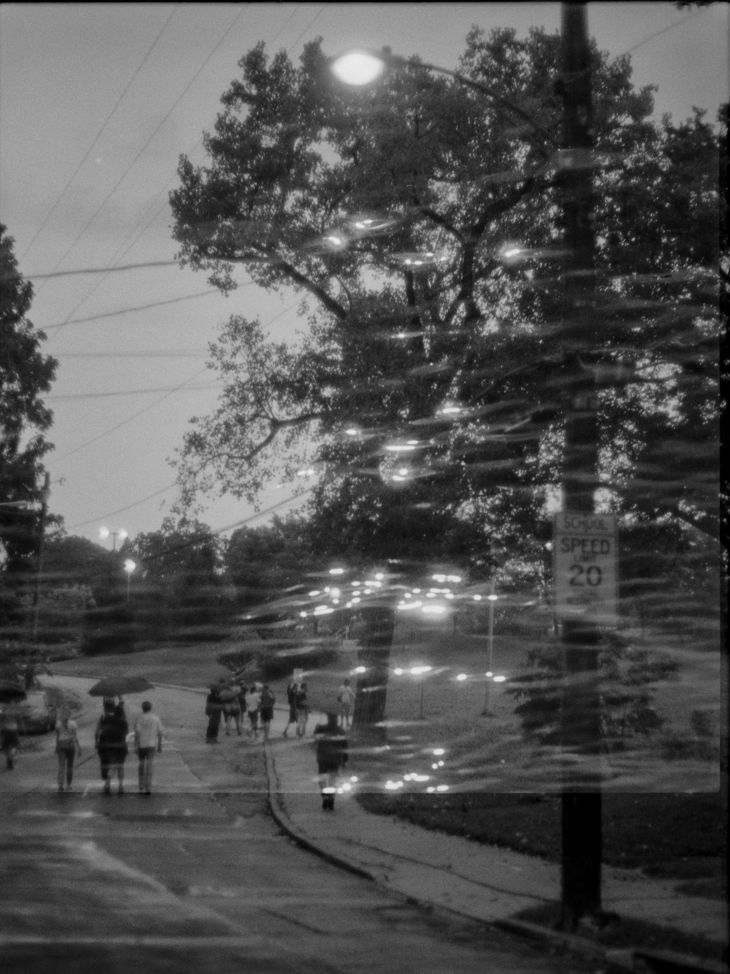 another rainy @northsidephotowalks but this time double exposed with sunset water reflections

|| august 2026 ||
|| #ilfordhp5 on a #minoltax700 ||
|| self dev &amp; scan ||
&mdash;&mdash;&mdash; &mdash;&mdash;&mdash; &mdash;&mdash;&mdash; &mdash;&md