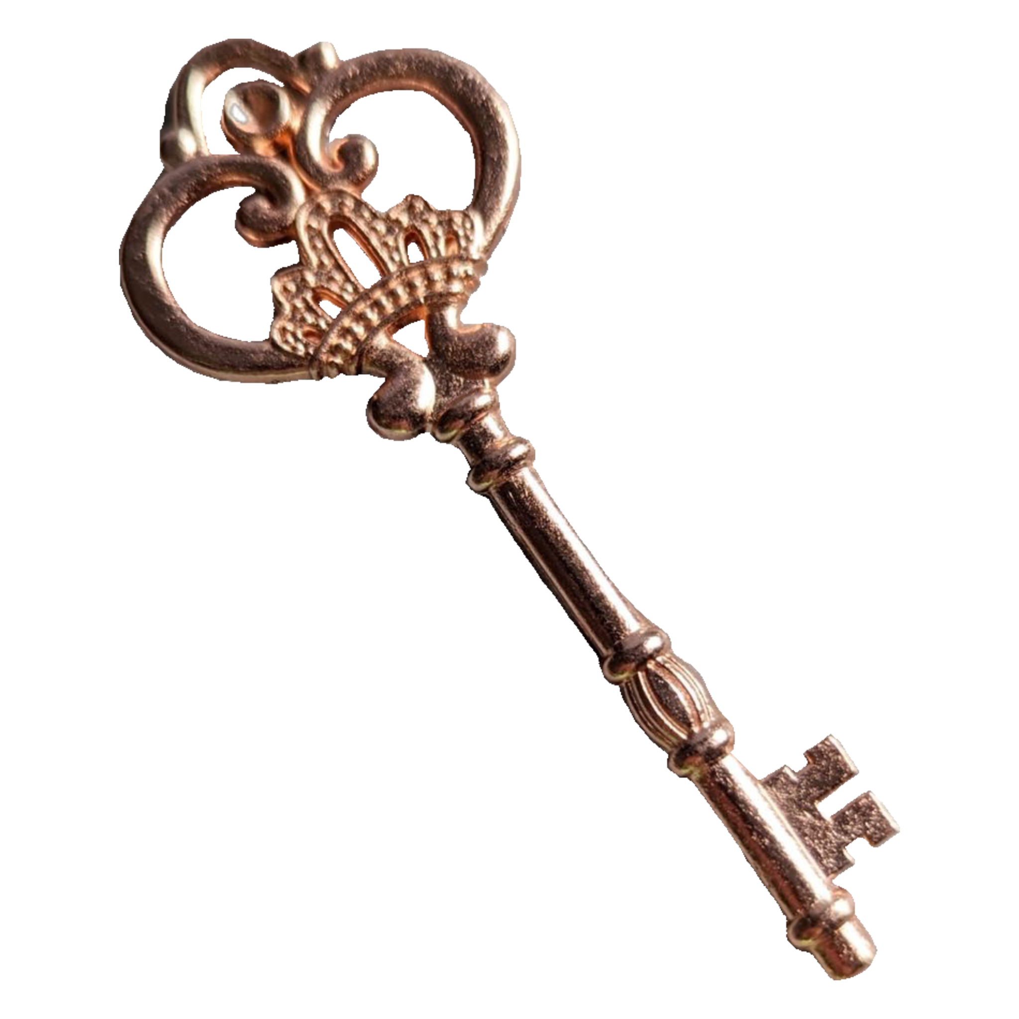 A decorative, ornate antique key with a gold-colored bow and intricate design elements.