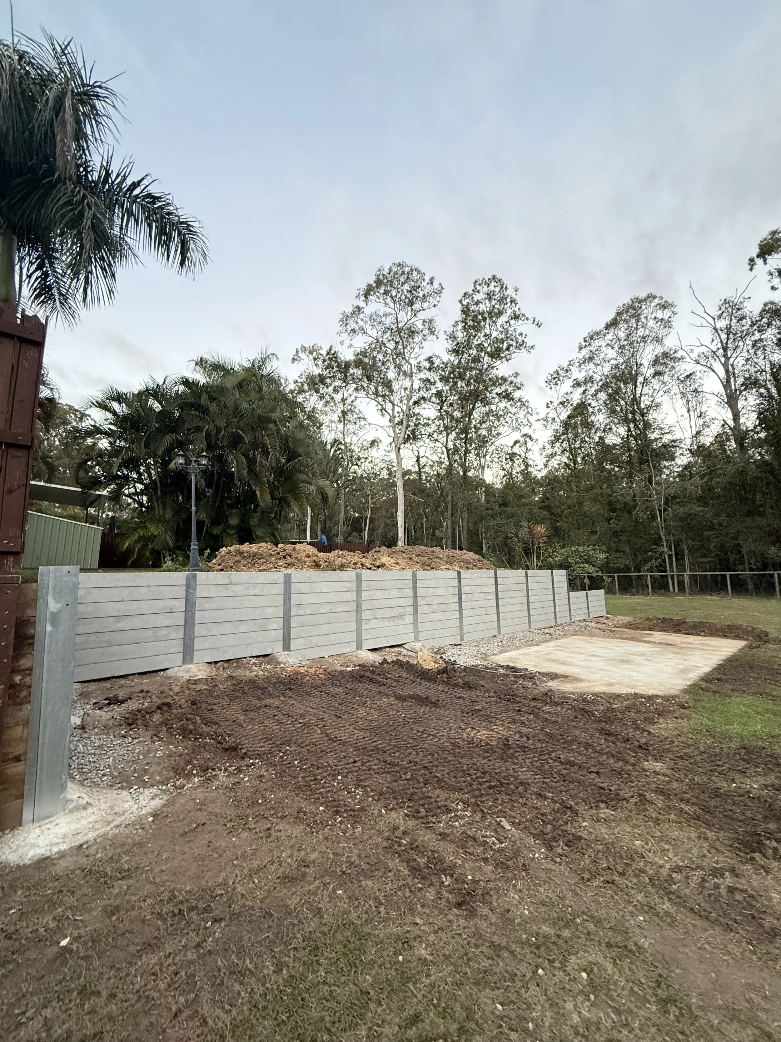 plain concrete sleeper retaining wall and 150 steel post built in forestdale brisbane qld