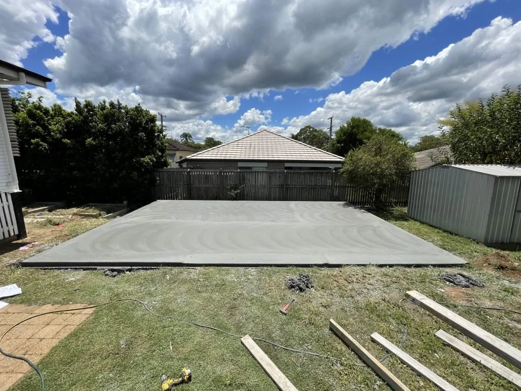 Reinforced concrete shed slab installation for a residential workshop in Brisbane
