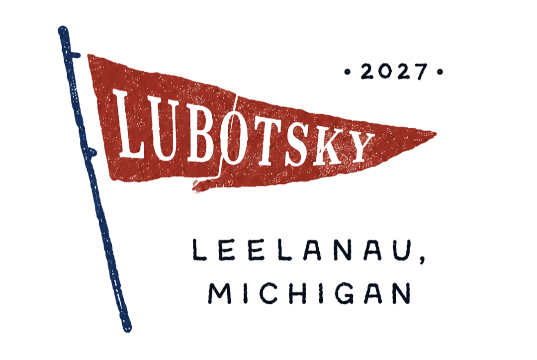 A sign with a red flag and the word "LUBOTSKY" on it, with additional text indicating Leelanau, Michigan, and the year 2027.
