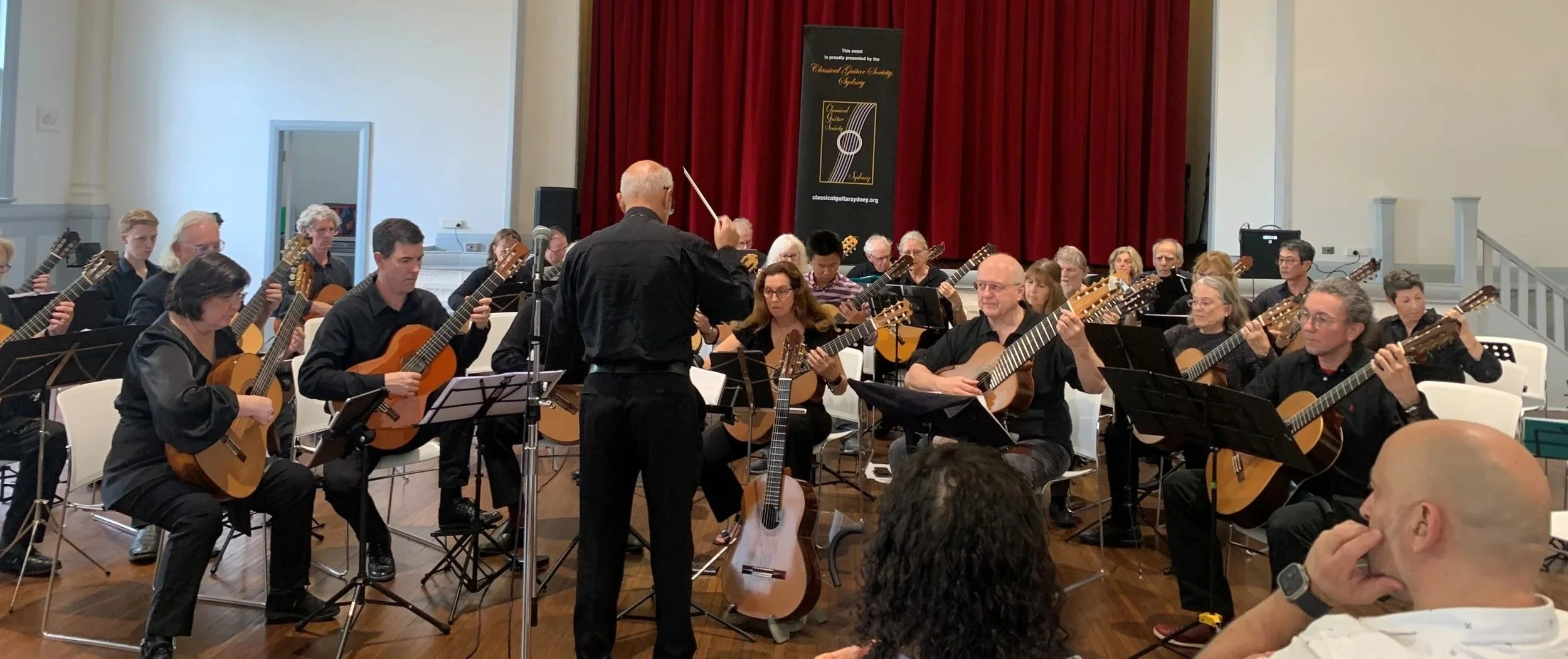 The CGS Orchestra playing at Balmain Town Hall in 2025