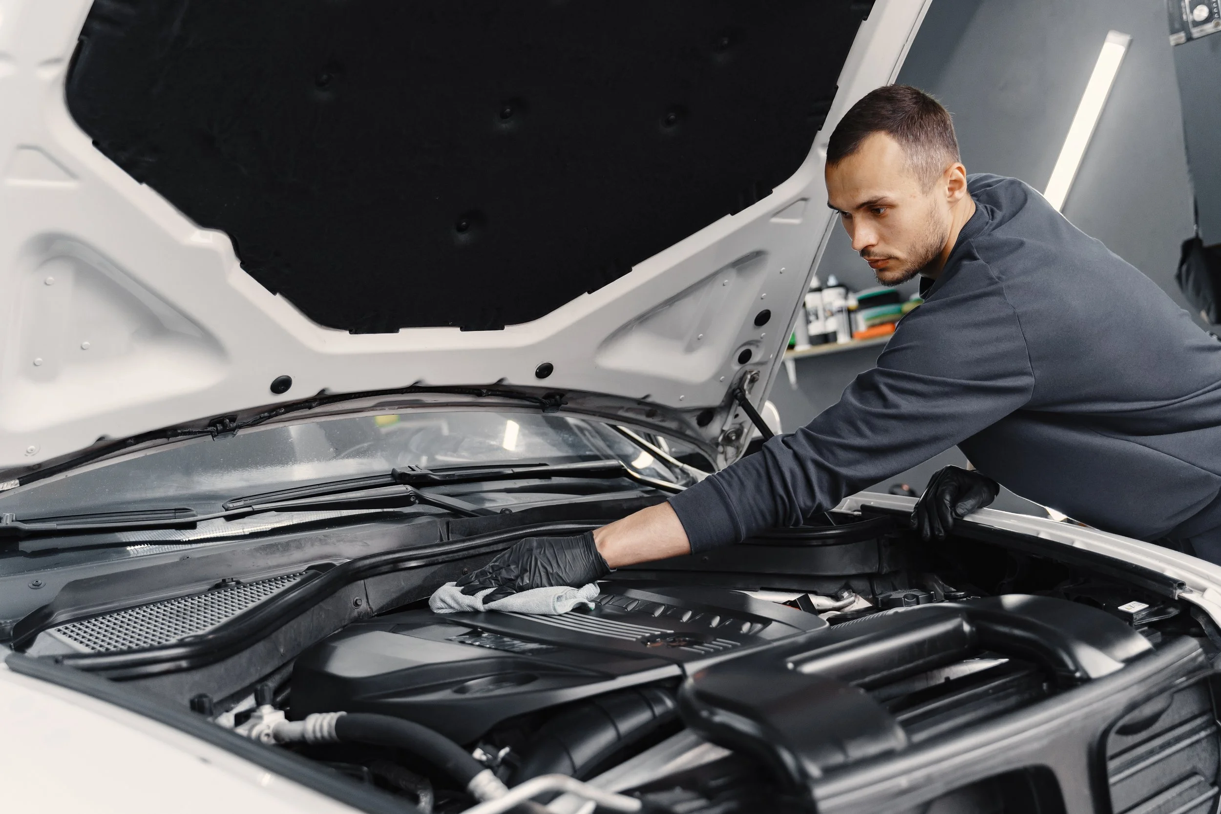 man-washing-engine-station.jpg.jpeg
