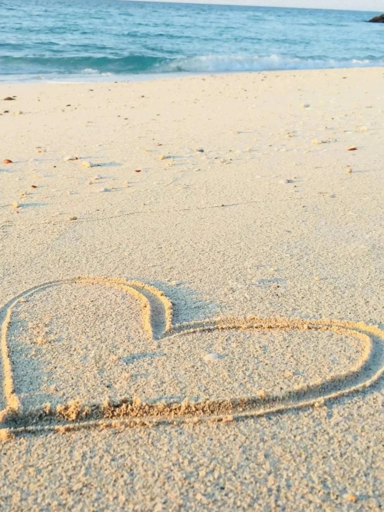 Blue Dragonfly Wedding and Events Heart Shape on the sand