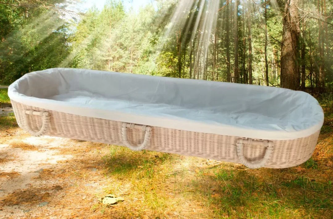 Daisybox wicker carrier for shroud burials and cremations lined with natural calico.jpg