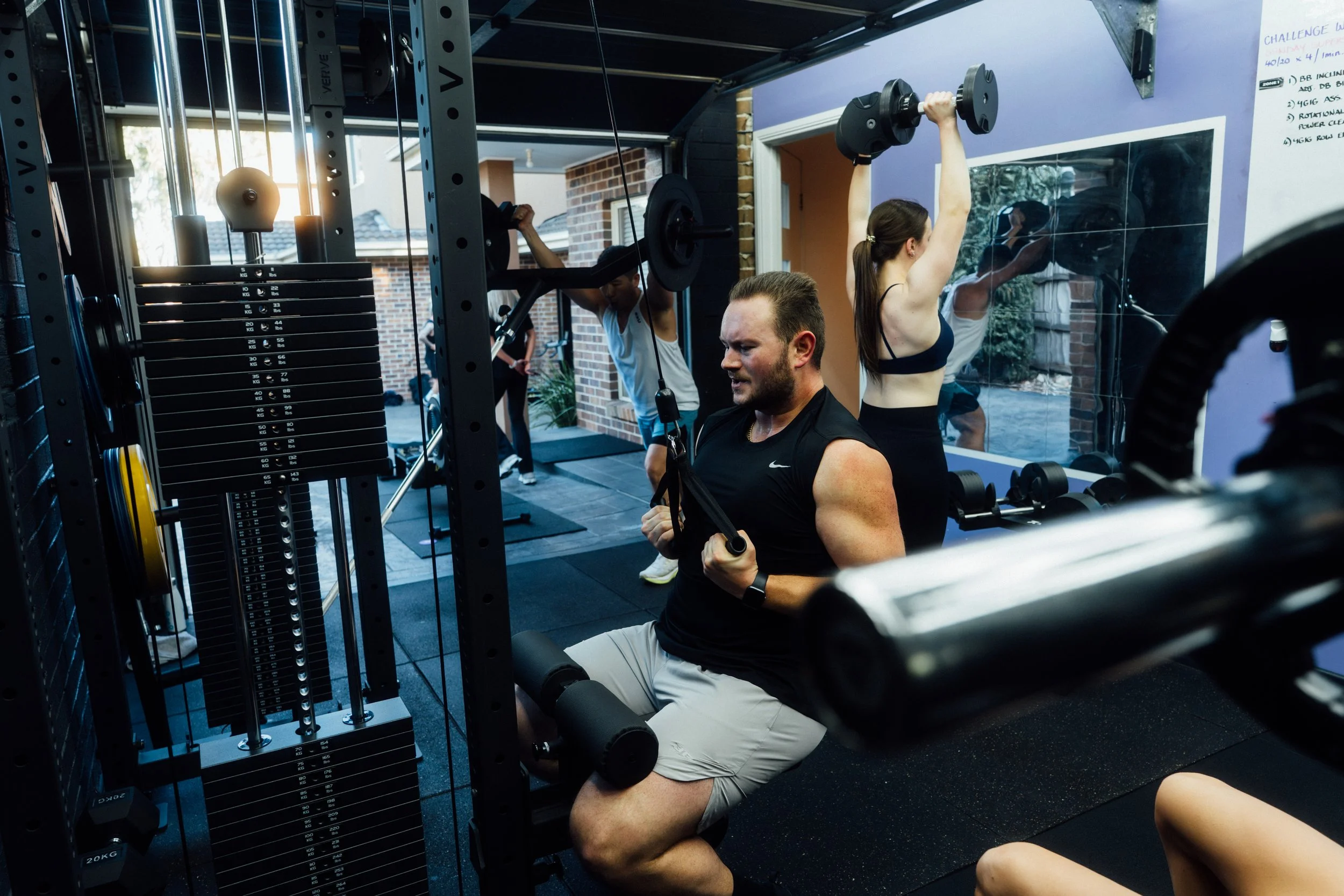 Members of Elite Athletic enjoying a Sunday Hybrid session