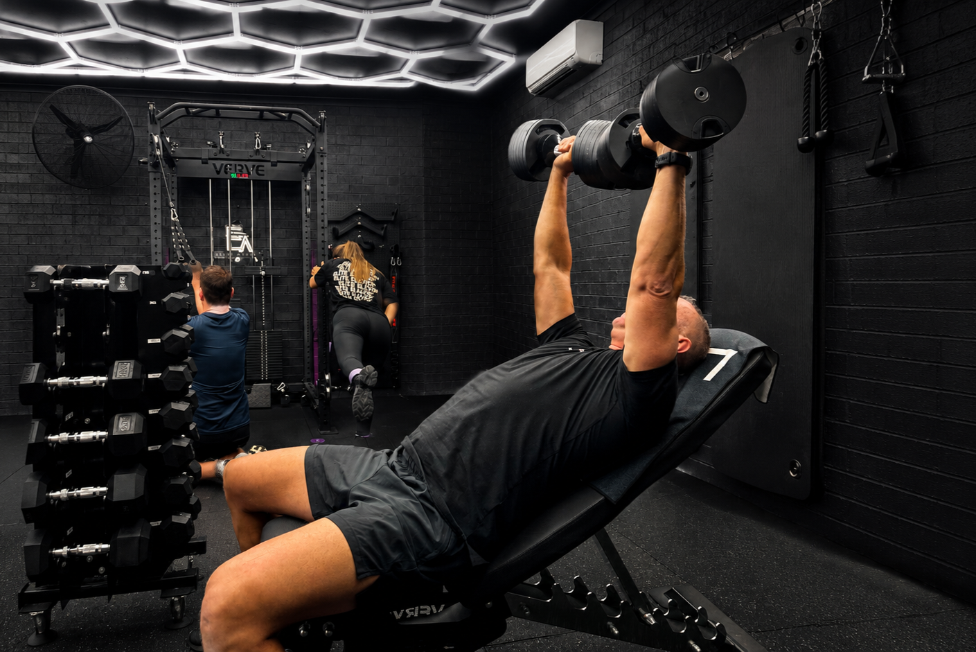 Elite Athletic in Sydenham, using strength training equipment as part of a coached small-group fitness session.