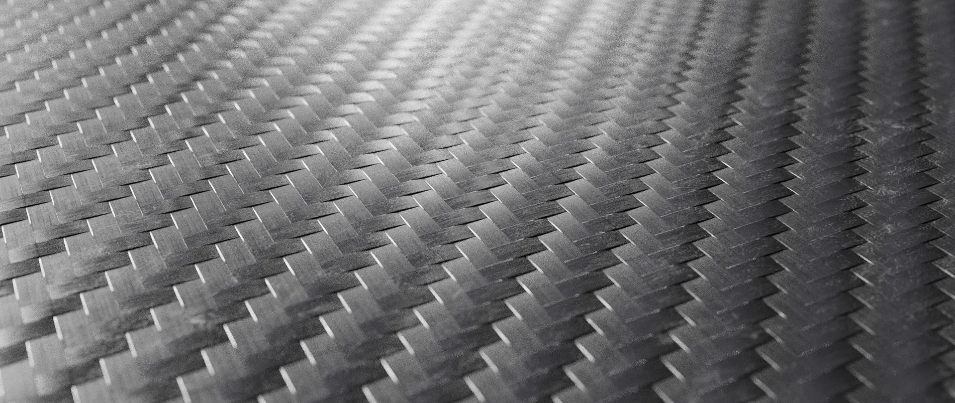Close-up of woven carbon-fibre composite, the material used in the Teraloop hubless flywheel rotor.