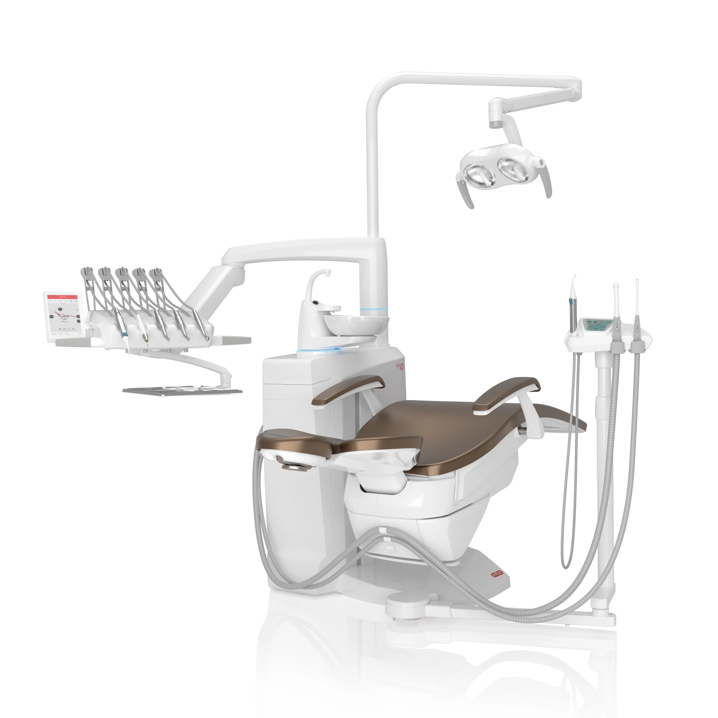 Dental chair with attached overhead light, handpieces, and dental tools.