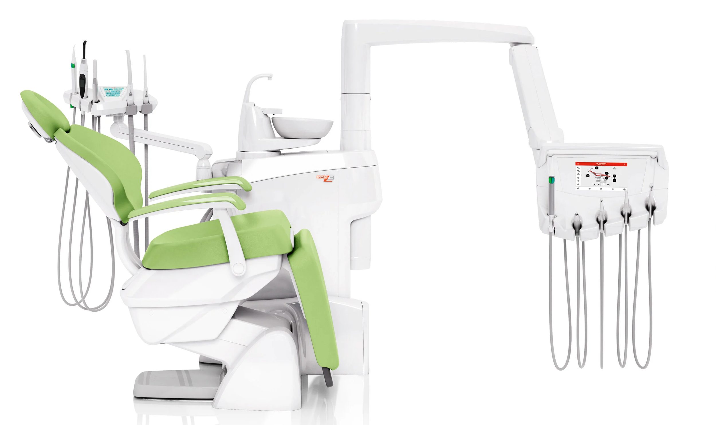 Modern dental treatment chair with green upholstery and attached dental equipment including handpieces, an overhead light, and a rinse sink.