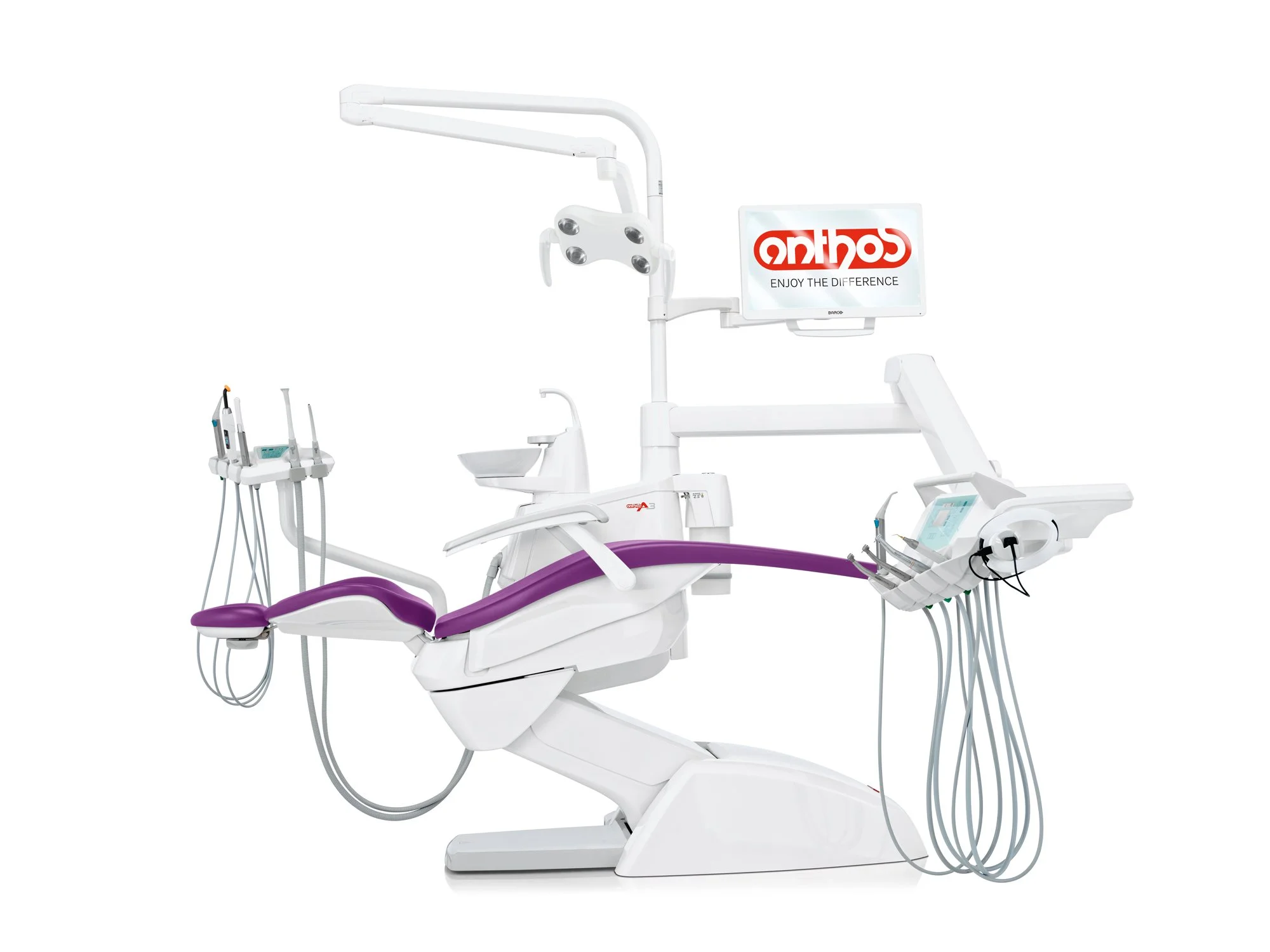 A modern dental chair with attached overhead light and dental tools, featuring a monitor displaying the logo 'antho' and the slogan 'Enjoy the Difference', against a plain white background.