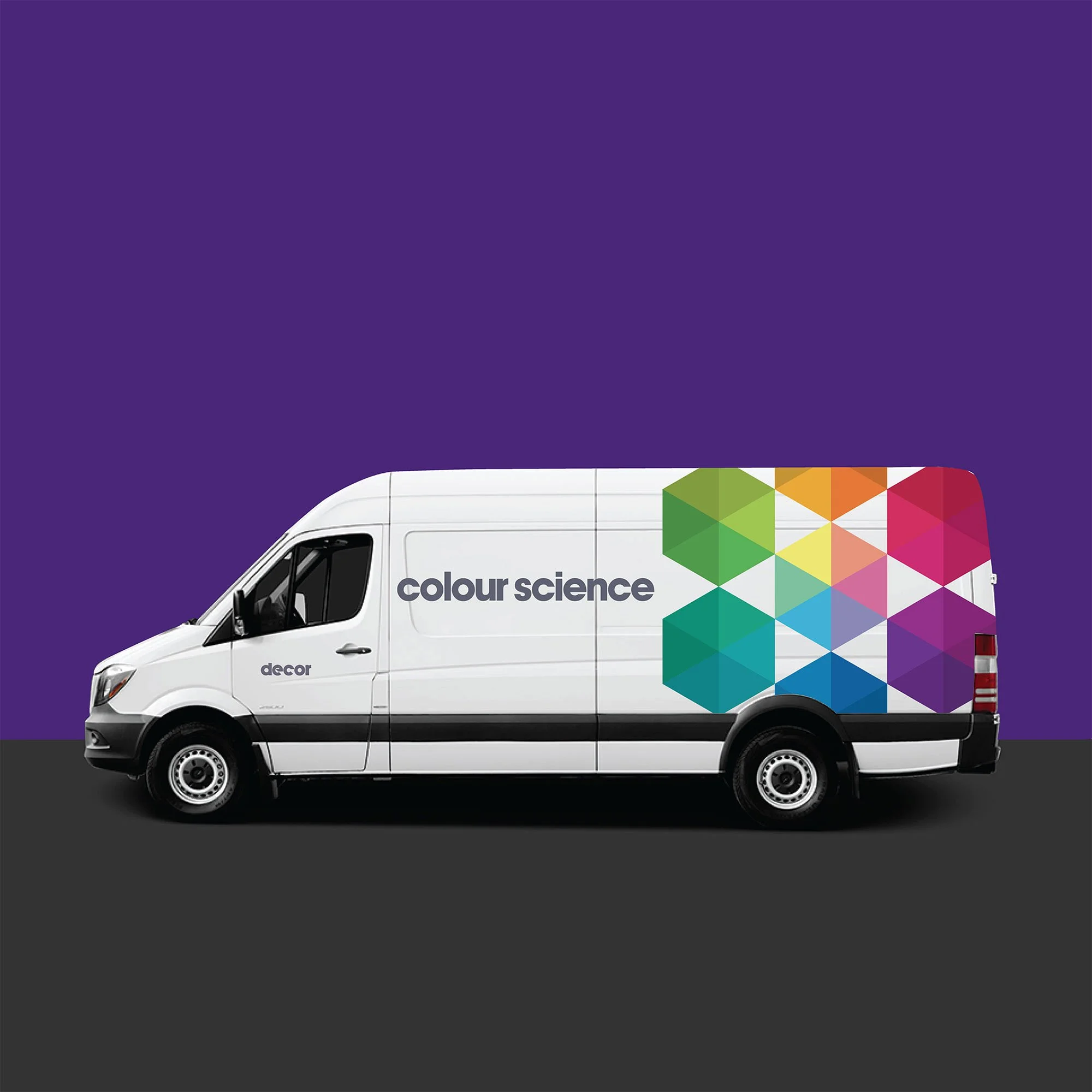 A corporate delivery van mockup with Propan 'colour science' and 'decor' branding featuring a vibrant geometric pattern on the side