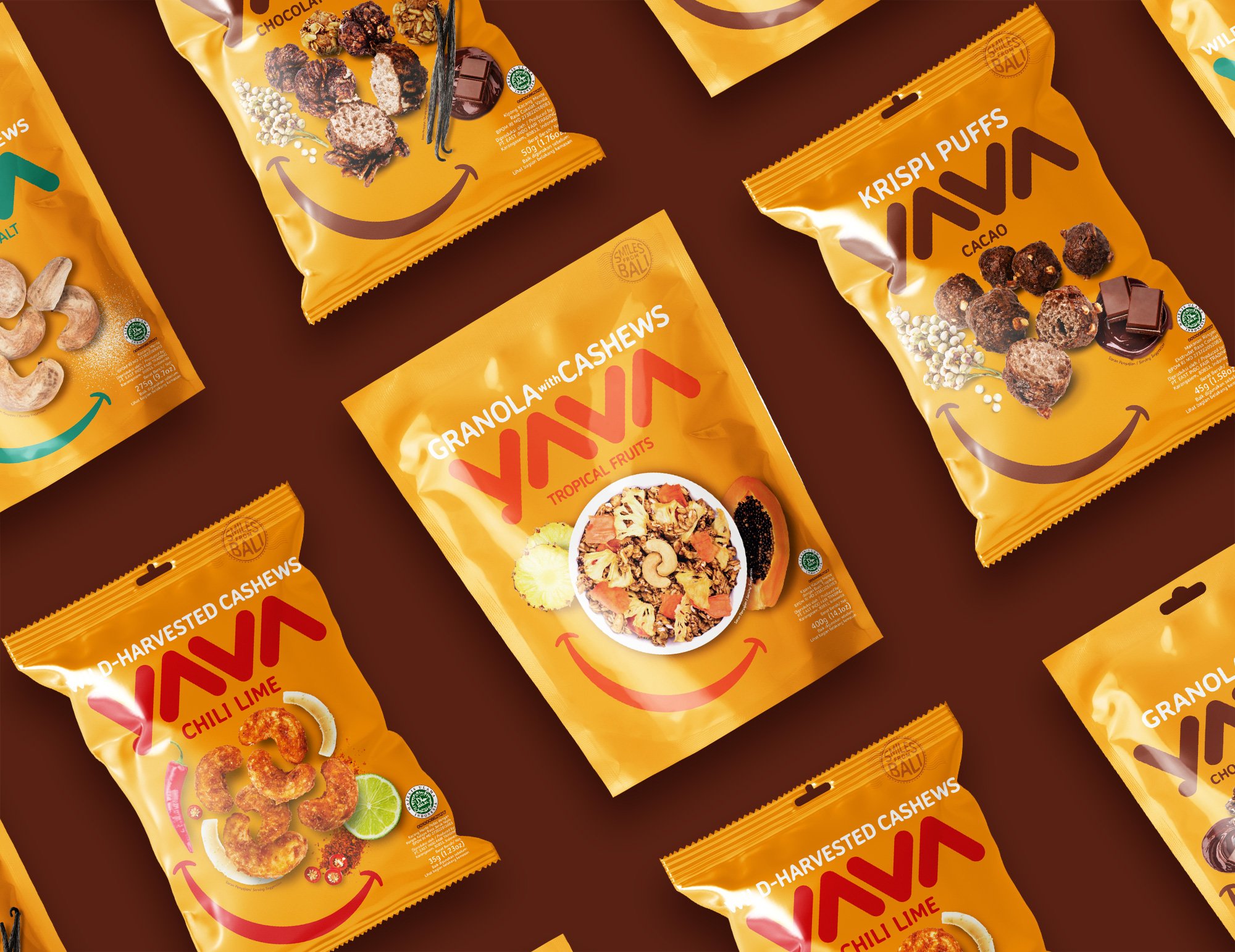 A repeating design pattern of yellow YAVA granola and cashew packaging packs