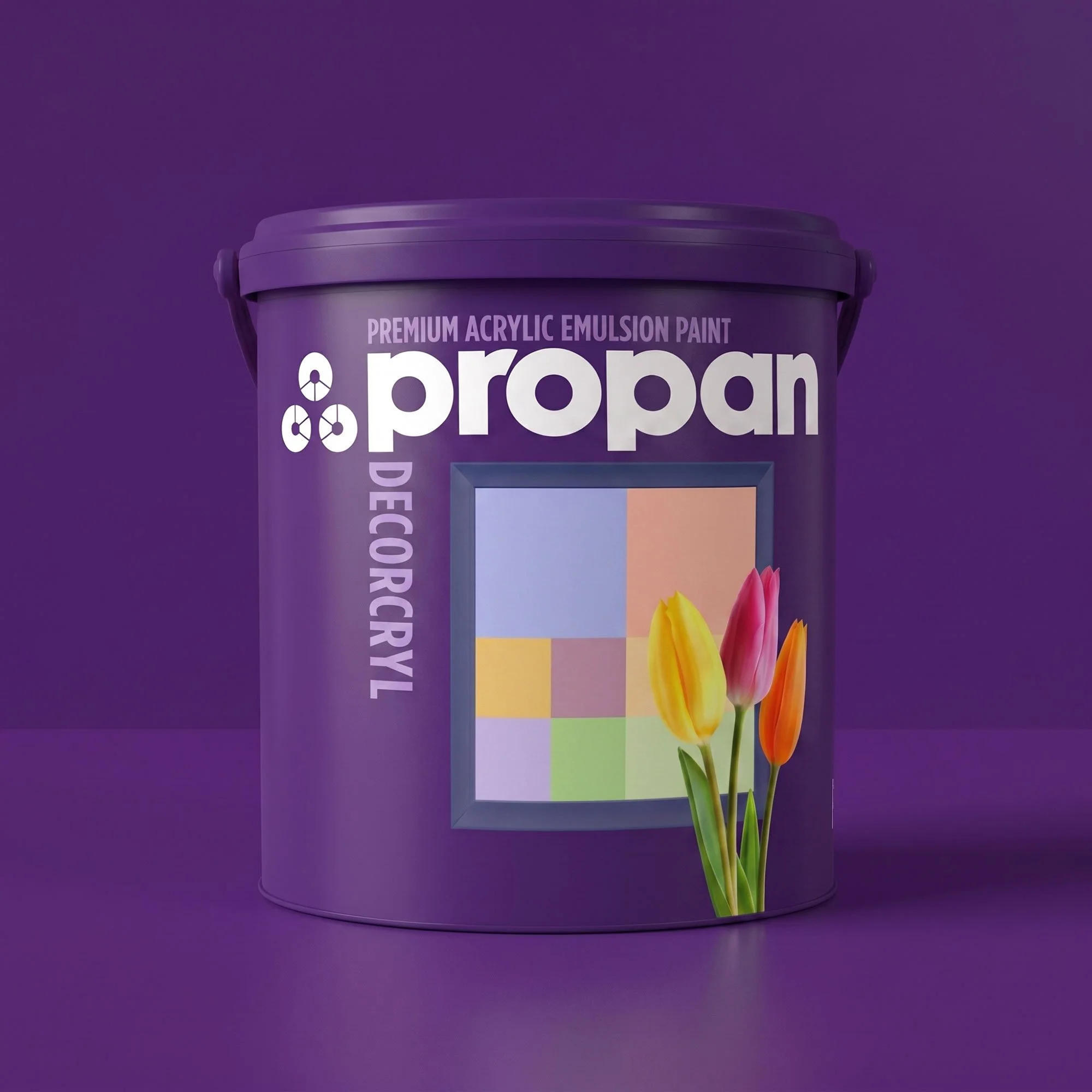 A purple Propan Decorcryl acrylic emulsion paint can displaying a colorful grid and tulips