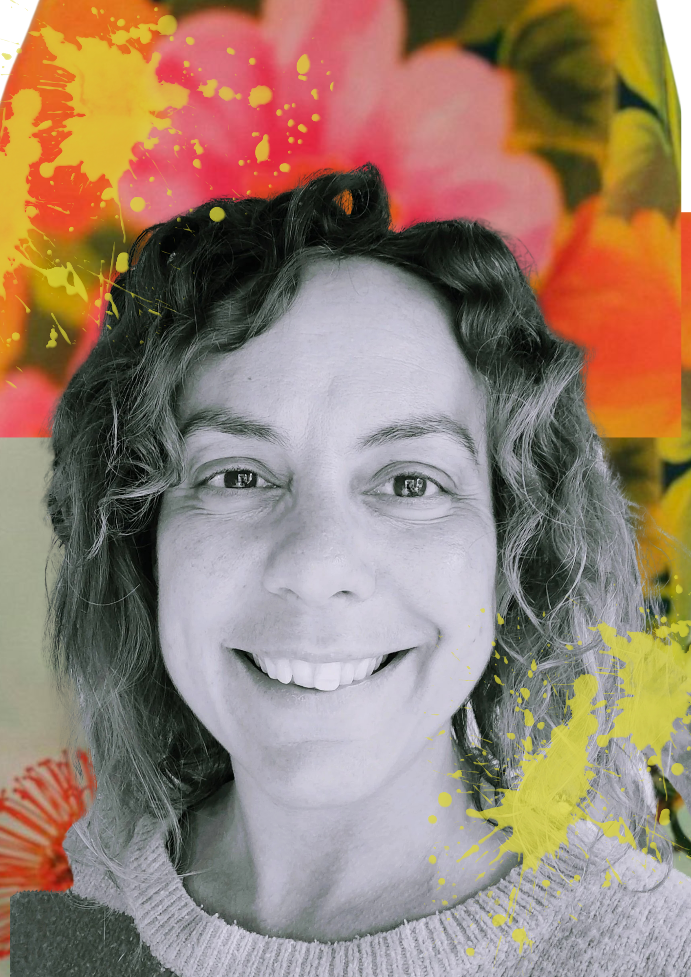 A smiling woman with curly hair, in black and white, with a colorful, abstract background featuring large pink and orange flowers and yellow paint splatters.