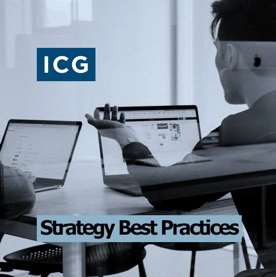 Person sitting at a table with two open laptops, discussing strategy, with a blue "ICG" logo and text "Strategy Best Practices" on the image.