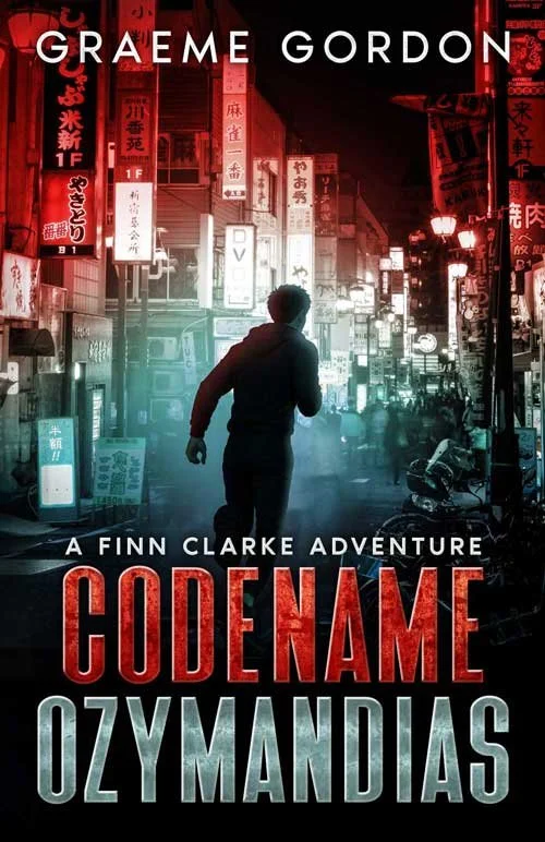Finn Clarke running down a city street at night, illuminated by neon signs in Japanese.