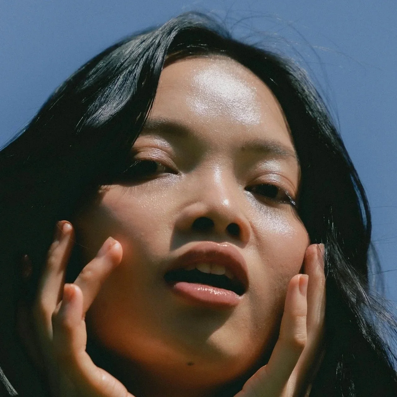 Girl sitting in the sun