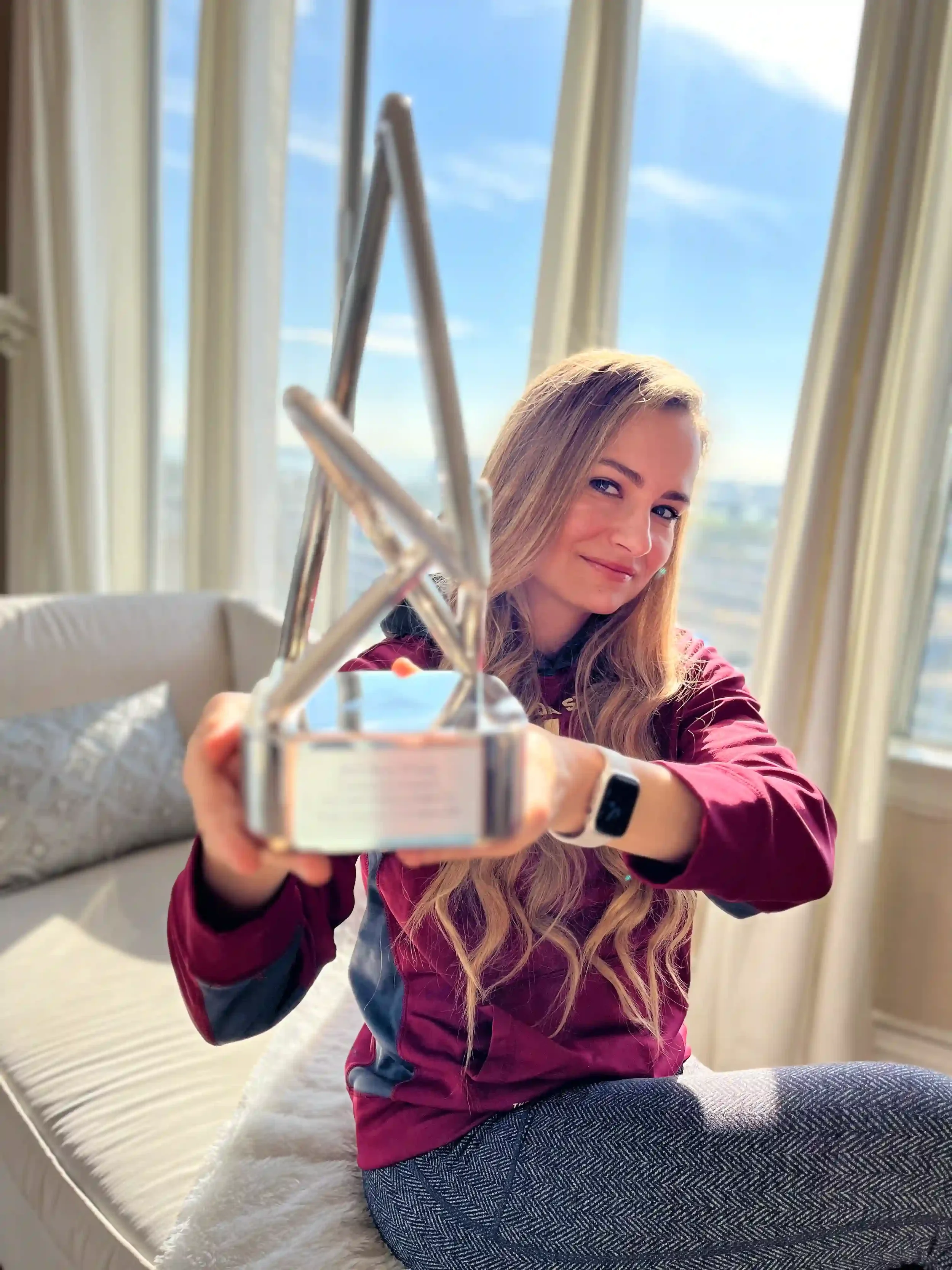 Gallery #9_Nadia holds Anthem Award_Dec 2022.webp