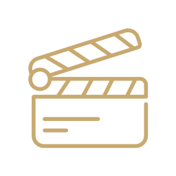 Icon of a film clapperboard, beige outline on a dark background.