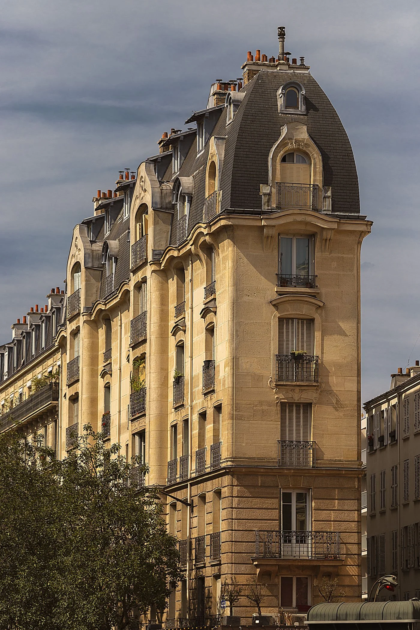 Classic Parisian apartment building with mansard roof, fine art architecture photography print by Hermès Gray, limited edition