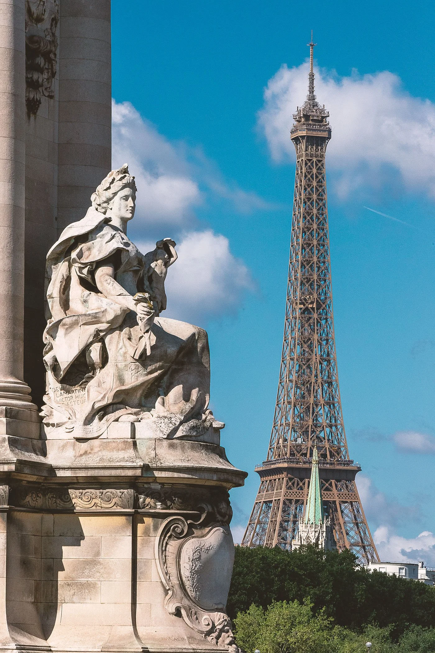 Marble statue with the Eiffel Tower in the background, Paris, fine art photography print by Hermès Gray, limited edition