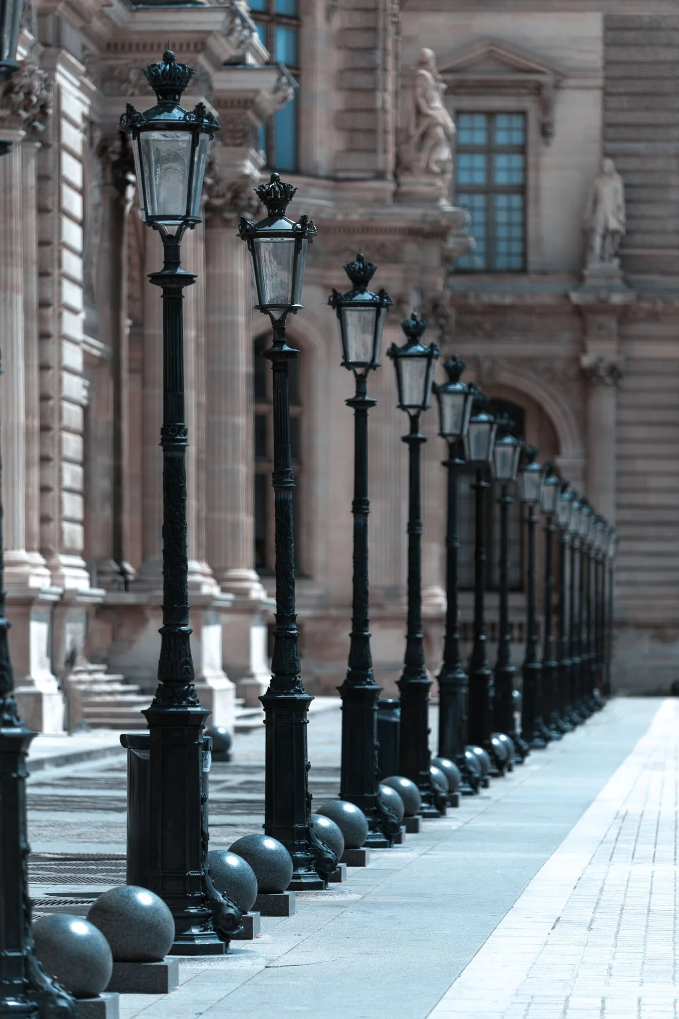 Vintage street lamps along a historic Paris street, fine art architecture photography print by Hermès Gray, limited edition