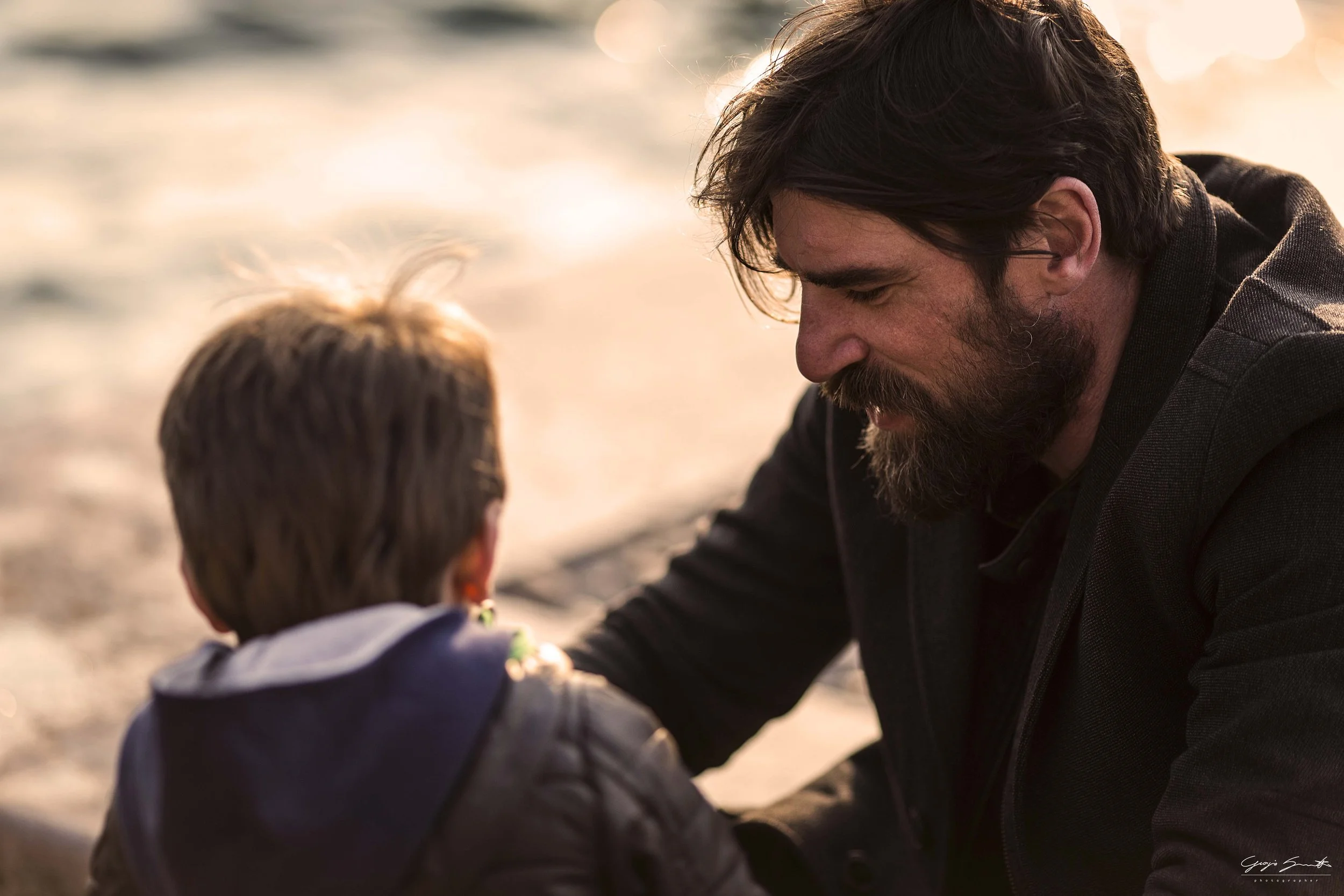Father and child in golden light, fine art photography print by Hermès Gray, limited edition