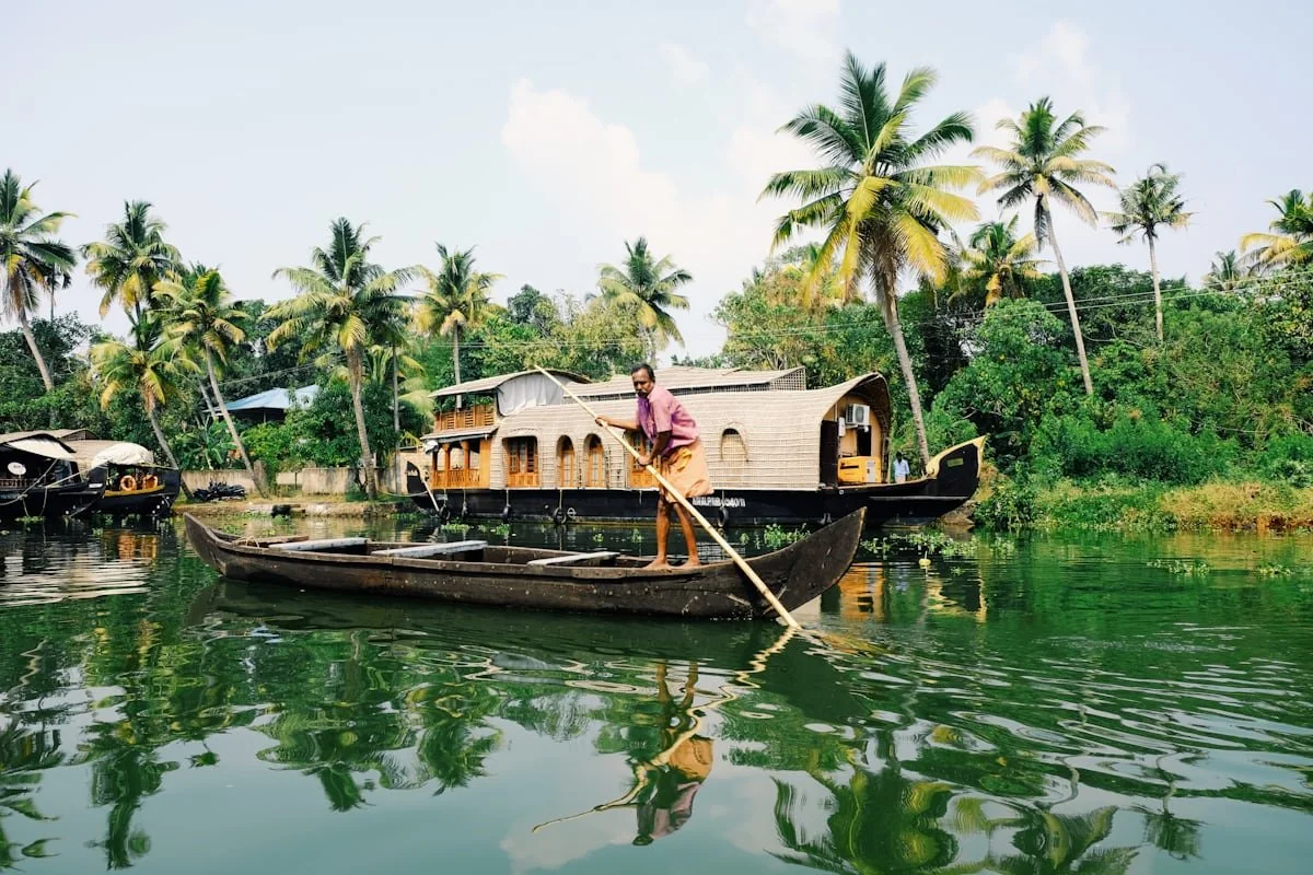 Traditional life on the calm rivers of Kerala, India, a signature nature immersion featured on our upcoming premium vegan travel journeys and eco-escapes