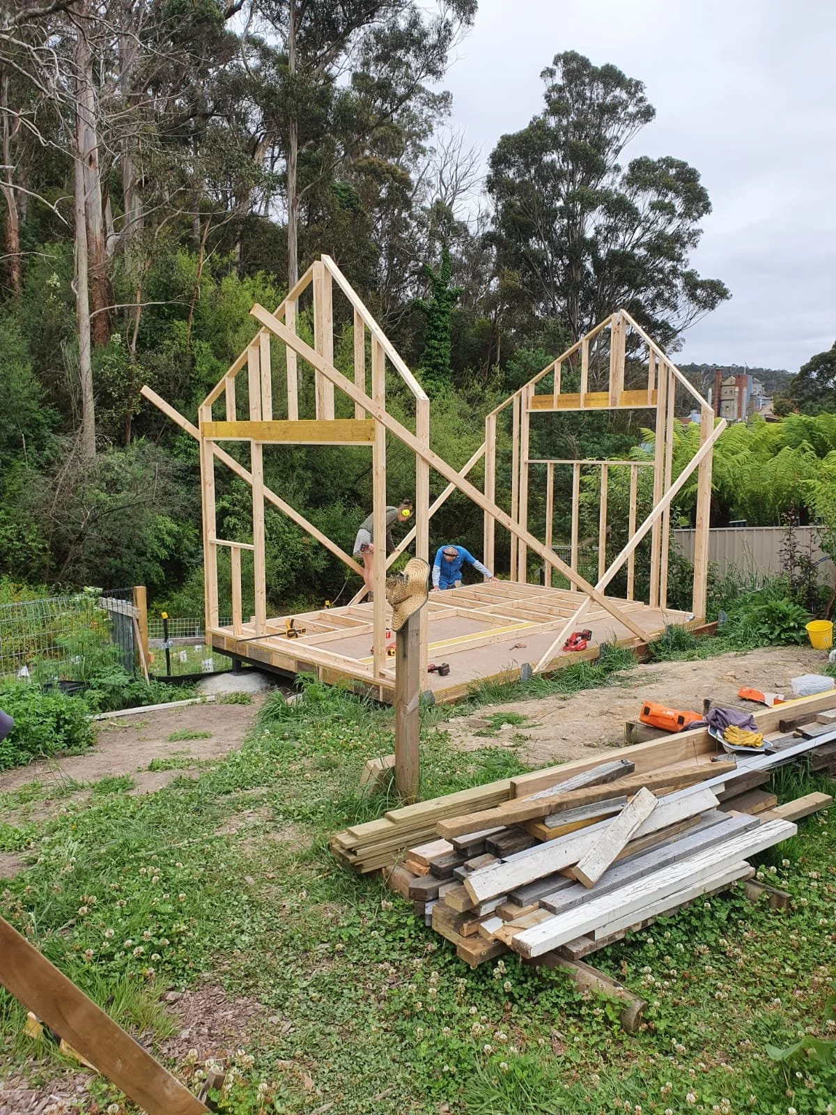 Students of different ages working together at Ground Up Workshops, enjoying the challenge and satisfaction of building a full-size timber frame in Hobart.