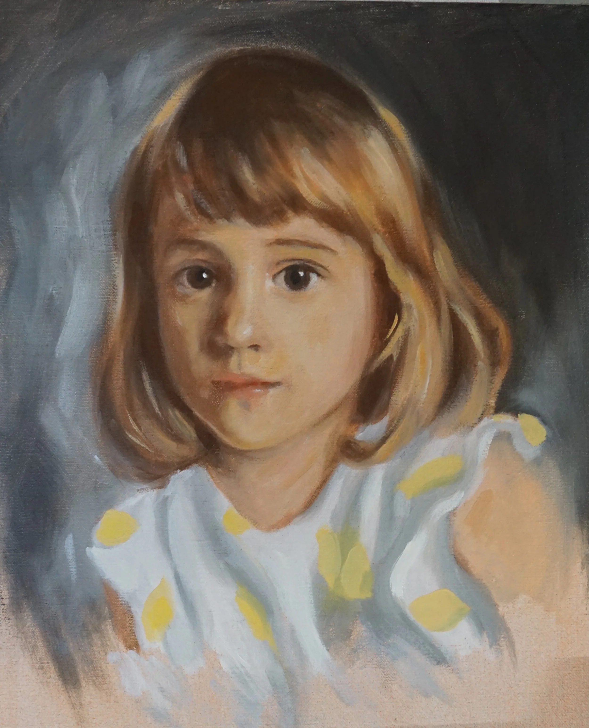 Close-up of a child's face, with brown hair and large eyes, wearing a white shirt with yellow polka dots, visible in a painted portrait.