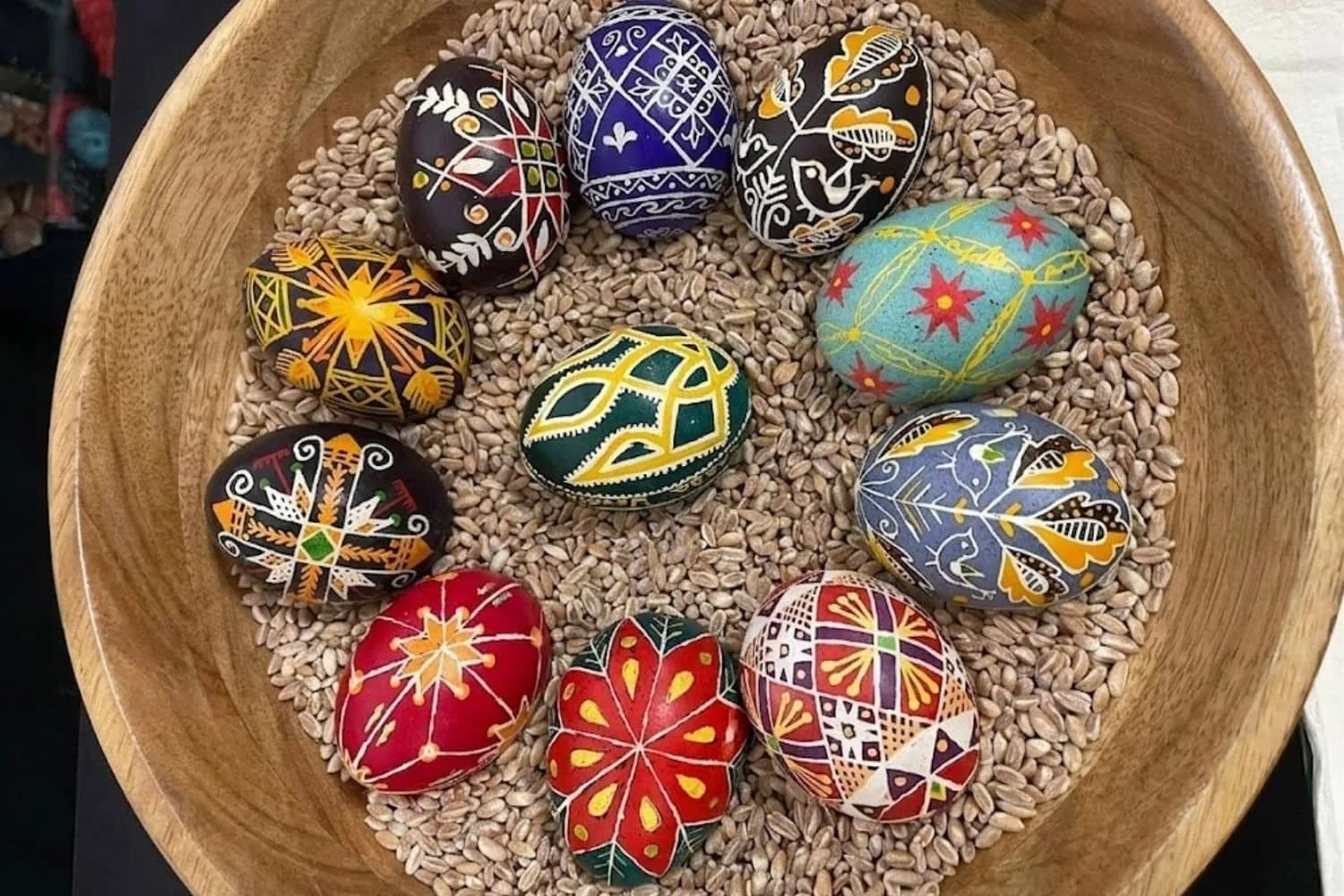 Photos of Ukrainian pysanky in a wooden bowl