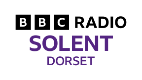 Logo for BBC Radio Solent Dorset with black and purple text.