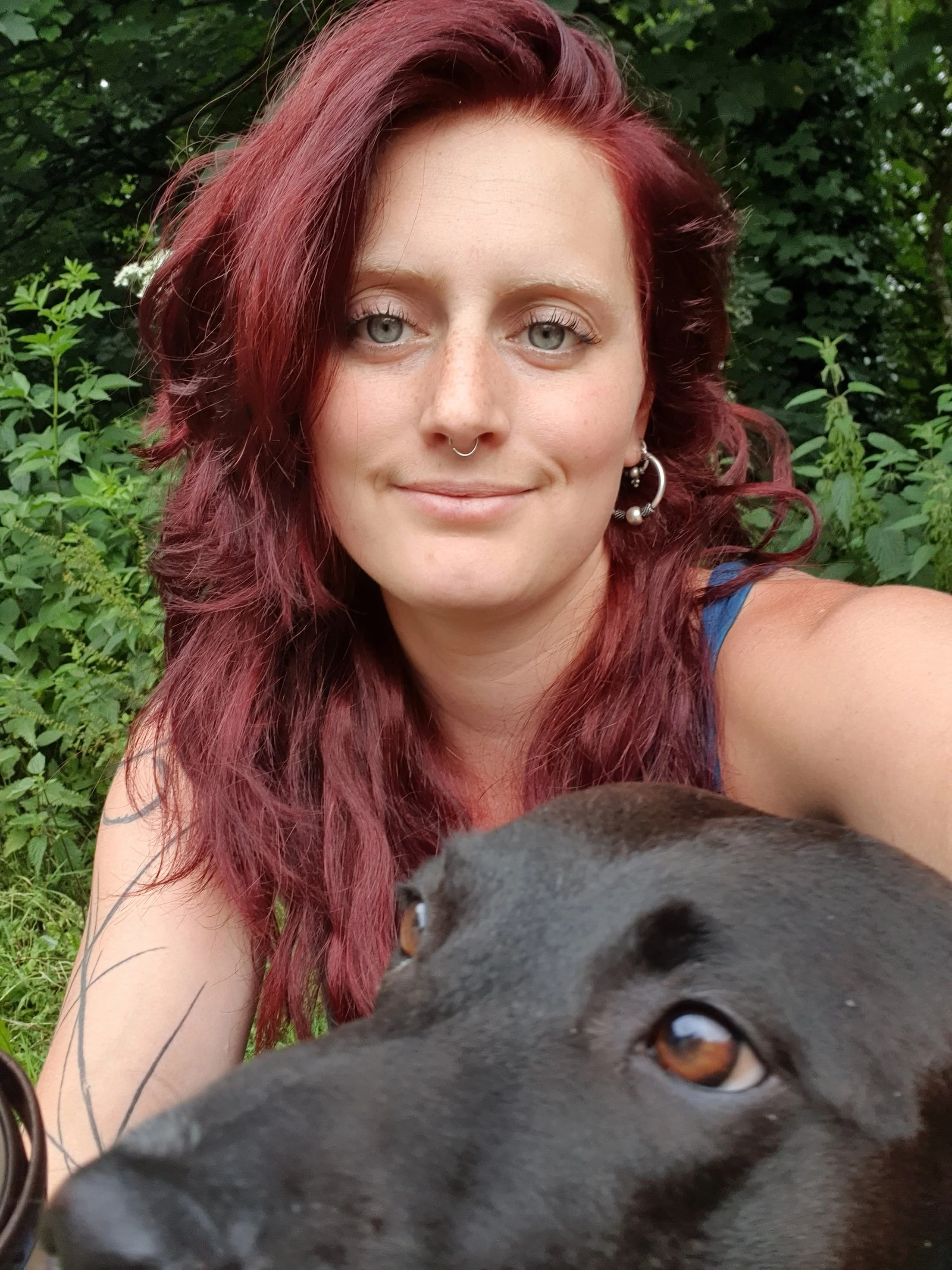 Dorset dog trainer, female, red hair with dog