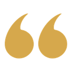 Gold quotation marks on a black background