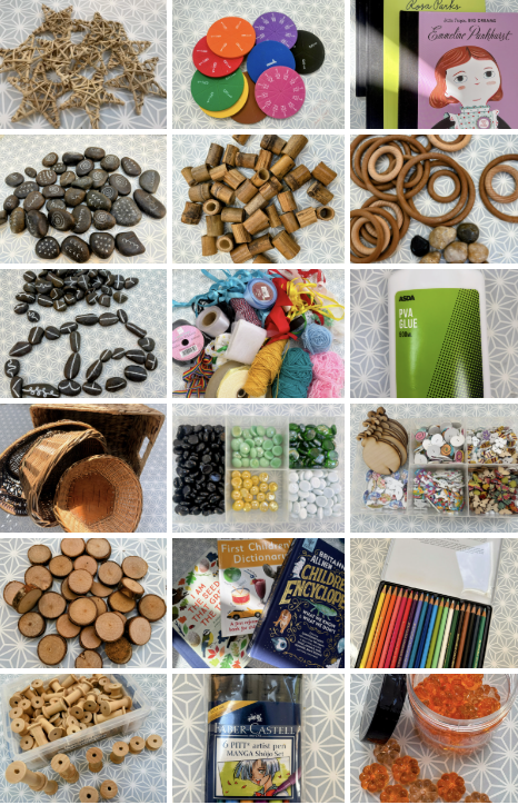 A collection of craft and school supplies including woven star decorations, colorful buttons, children's storybook, decorated stones, corks, rubber rings, black stones, embroidery floss, PVA glue, woven baskets, beads and buttons, children's books, colored pencils, wooden beads, art supplies, and orange craft beads.