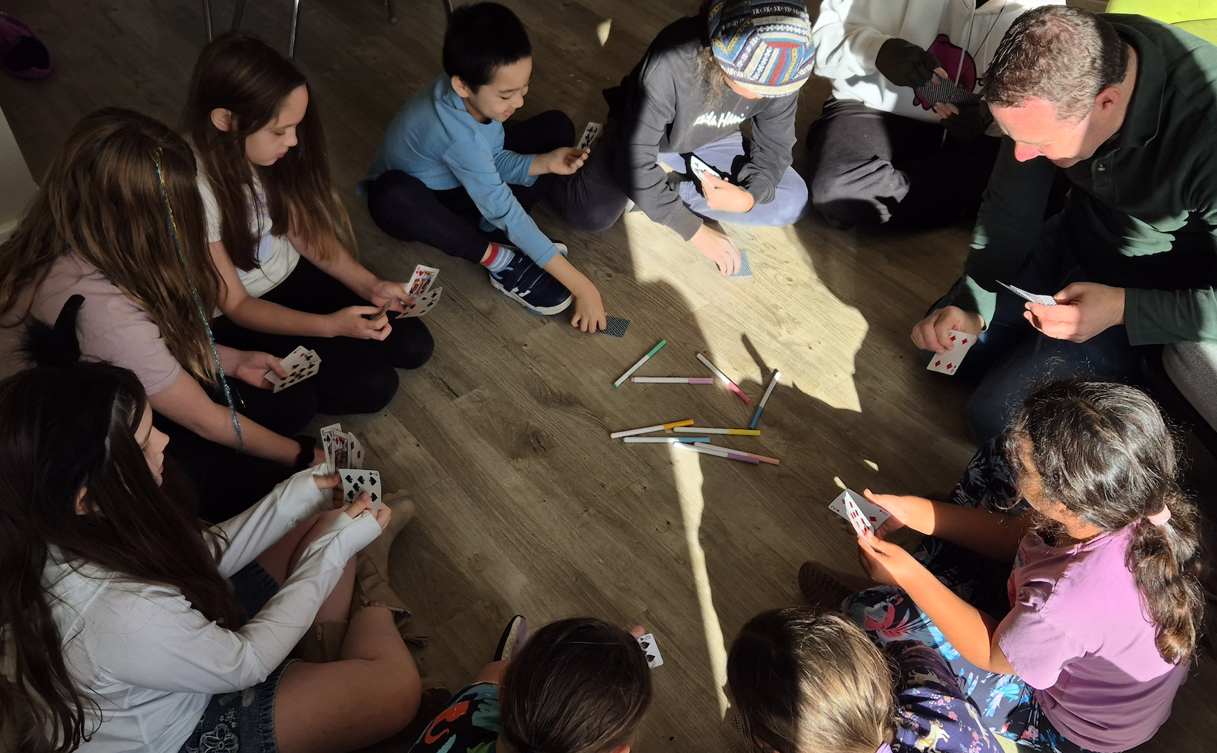 Children and facilitator as equals in a circle