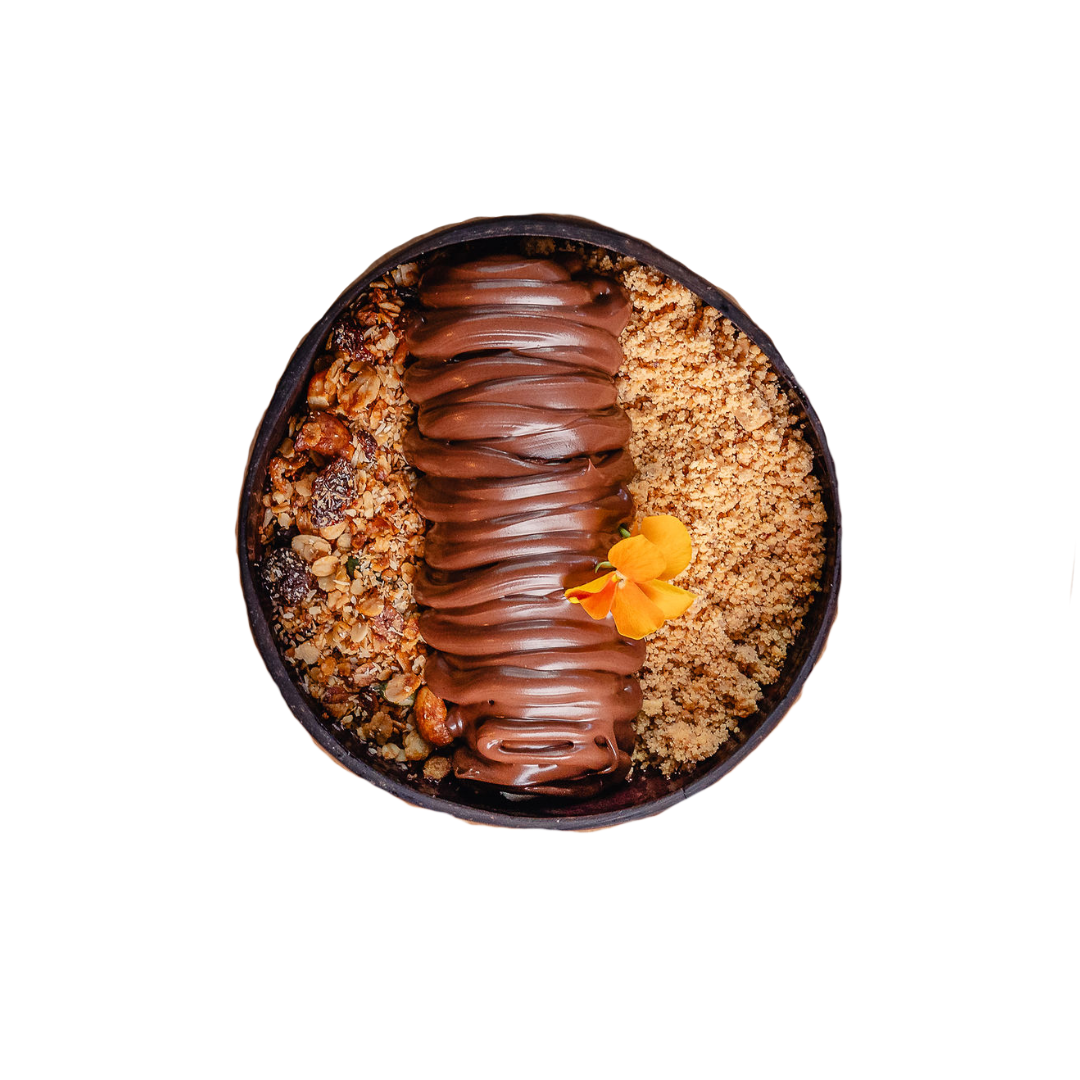 Açaí with a chocolate swirl topping, granola, crumble, and an edible orange flower garnish