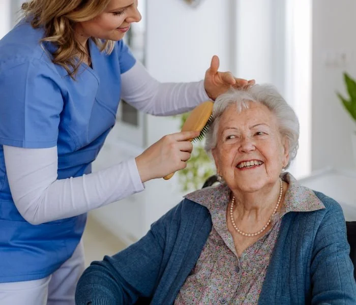 Caregiver providing elderly personal care in Medford