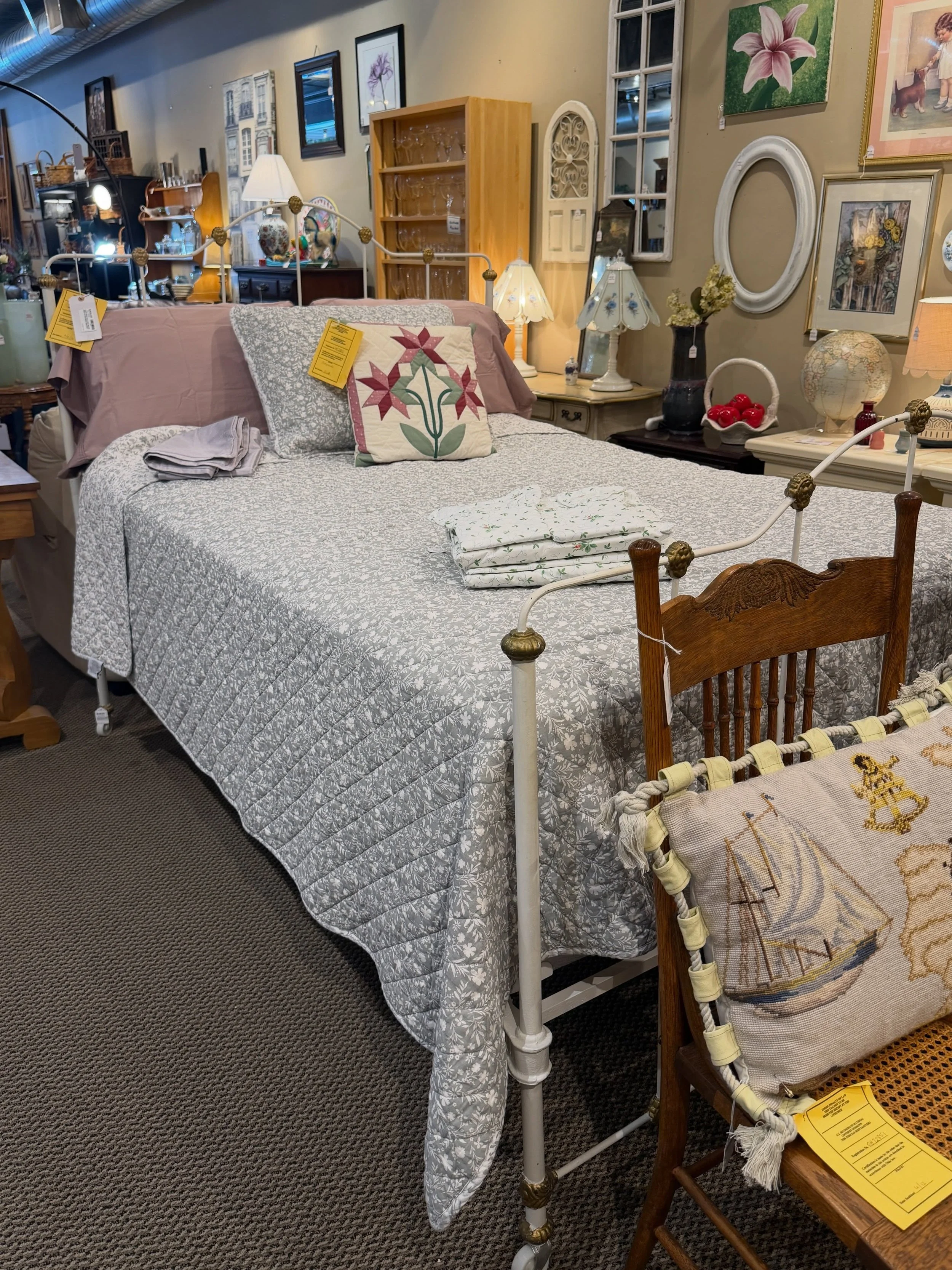 The iron bed may have stolen the spotlight&hellip;

&hellip;but don&rsquo;t miss everything around it. From quilts and lamps to artwork, mirrors, and vintage bedroom accents, there are plenty of beautiful finds waiting throughout the shop.

Shop loca