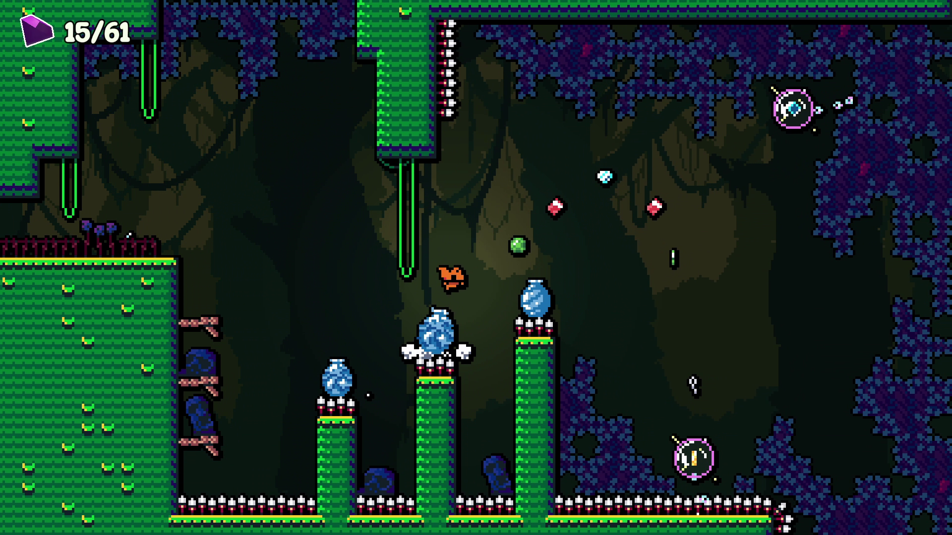 Pixel art screenshot of a platform video game set in a dark, jungle-like environment. Green platforms with yellow accents, floating water droplets, and purple foliage are visible. The scene includes various enemies and projectiles, such as a purple c