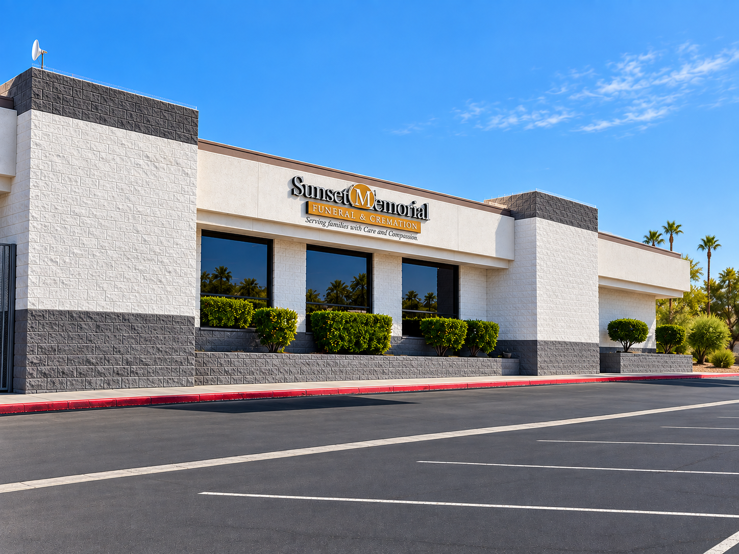 Sunset Memorial Funeral and Cremation building with landscaping, large windows, and clear blue sky.