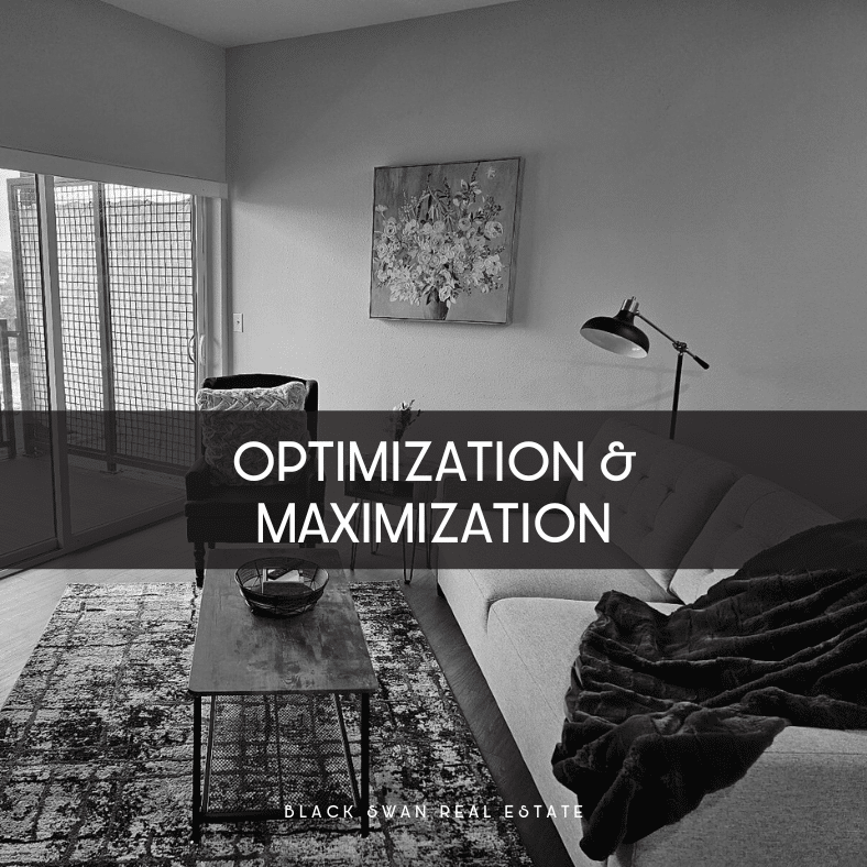 Living room with sitting area, painting on wall, sliding glass door, and modern decor, overlay text reads 'Optimization & Maximization' with 'Black Swan Real Estate' at the bottom.