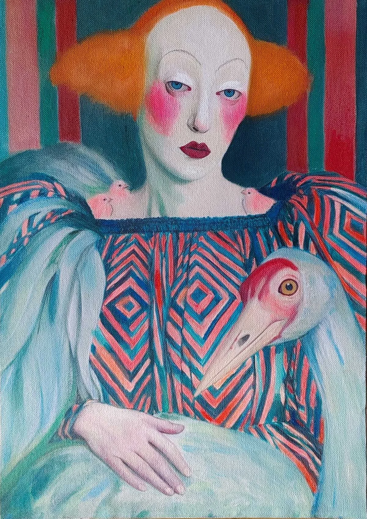 A surreal portrait of a woman with pale skin, pronounced facial features, pink cheeks, and dark red lipstick. She has orange hair with large side buns and wears a colorful, geometrically patterned dress. She is holding a large bird, possibly a heron, with a long neck and beak, which also has a pink face and a yellow eye. The background features vertical red and green stripes.