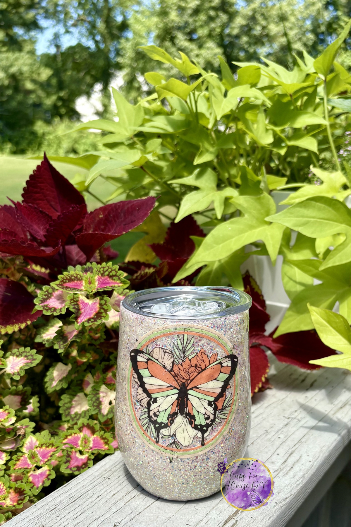 Tan, orange and green butterfly "wine"