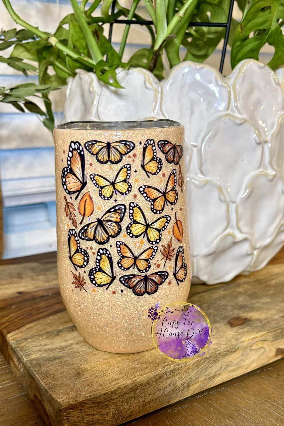 Butterflies on orange glitter