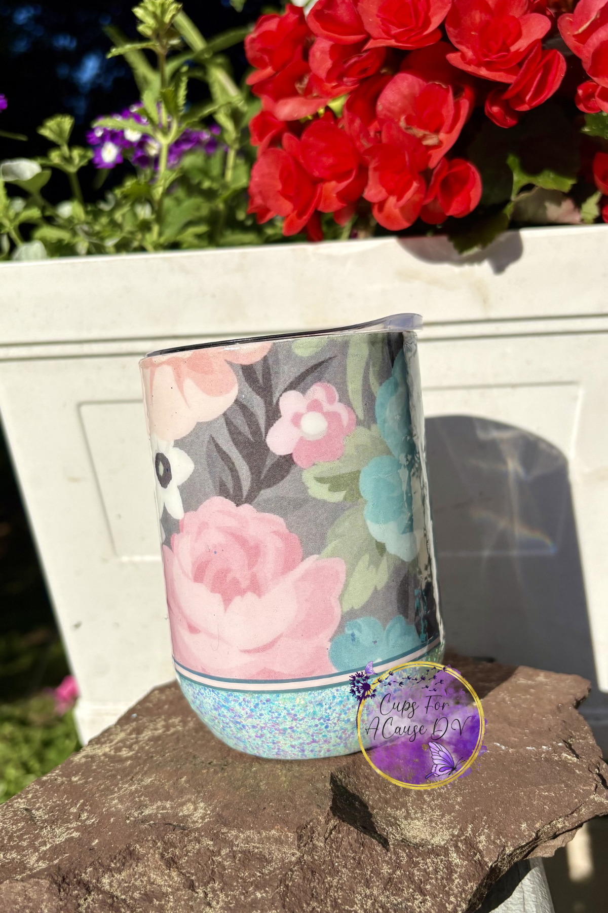 Pink and blue flowers with blue glitter “wine”