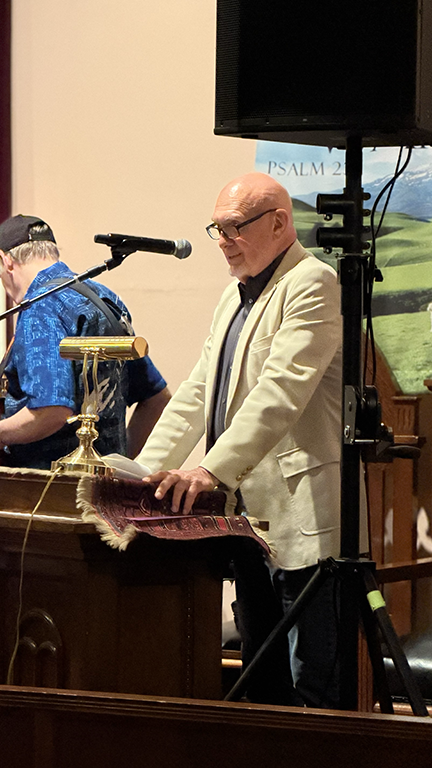 John Ebbot speaking ahead of Two Old Men and Friends Preservation Concert at Pleasant Valley Country Church