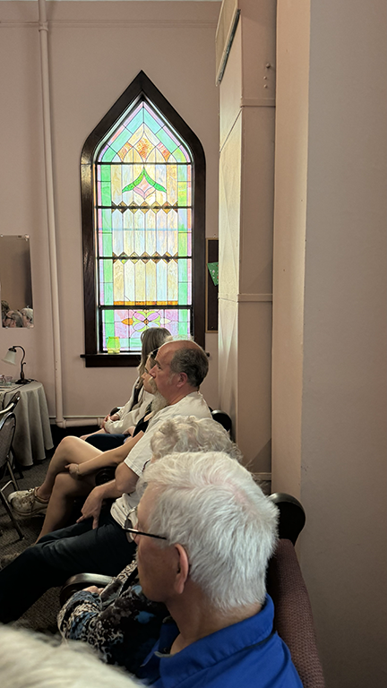 Guests watching Two Old Men and Friends perform at Pleasant Valley Country Church